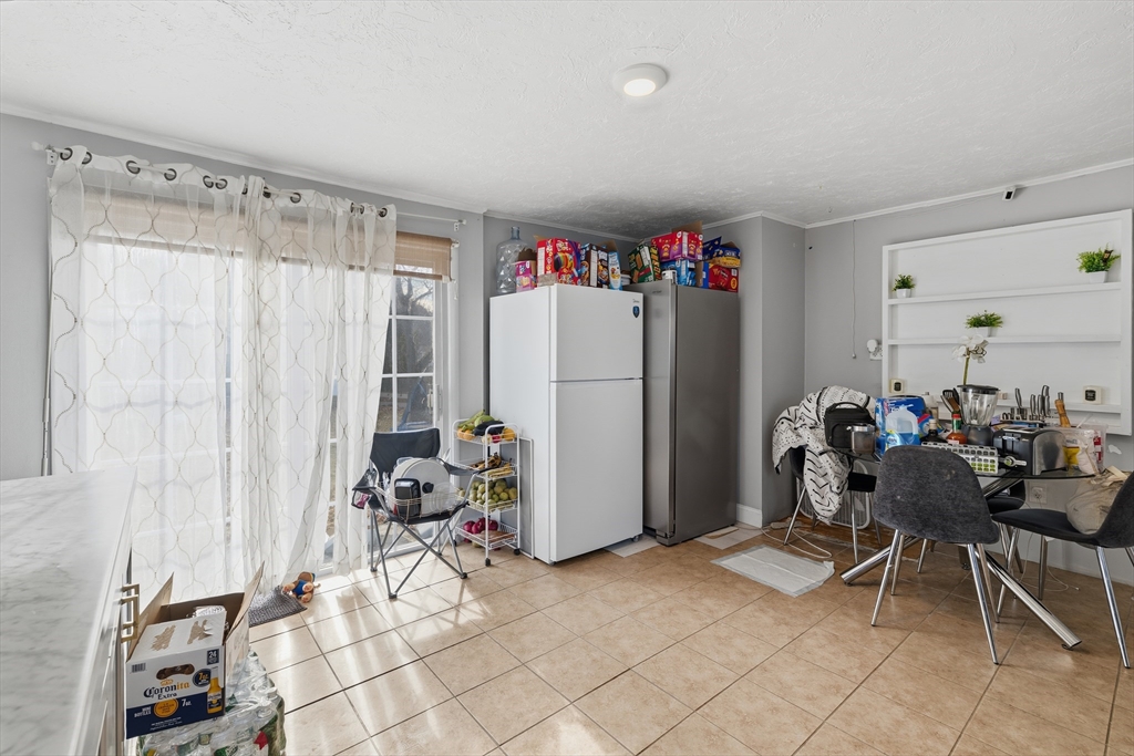 62 Main Street Saugus, MA 01906 - Photo 6 of 24 a view of a room with gym equipment