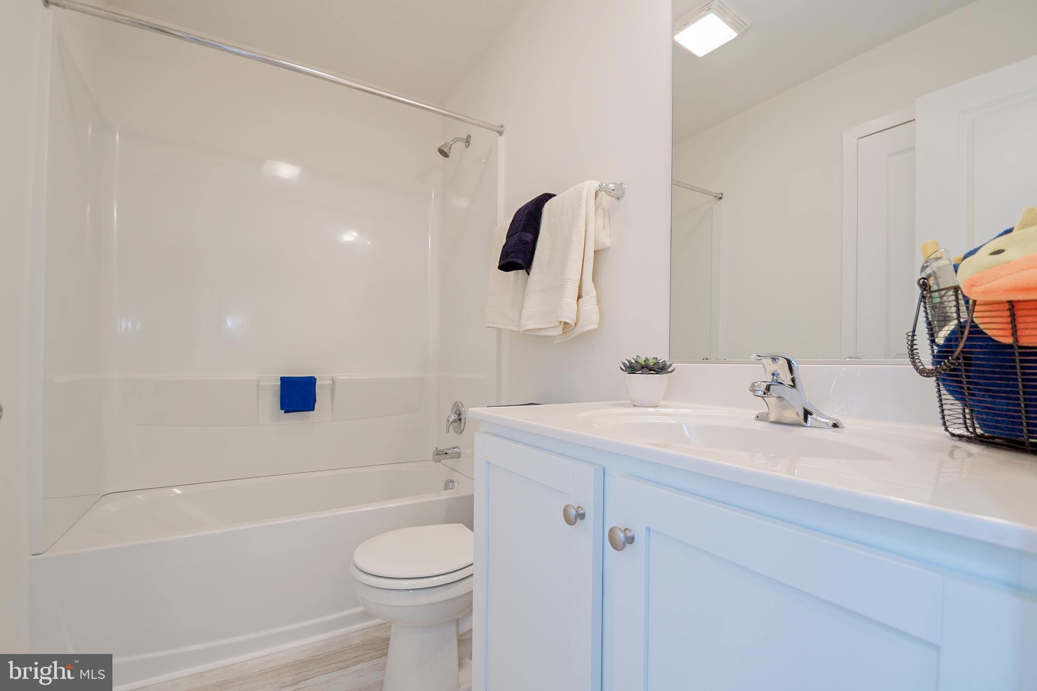 206 Case Road Townsend, DE 19734 - Photo 21 of 26 a bathroom with a sink a toilet and shower