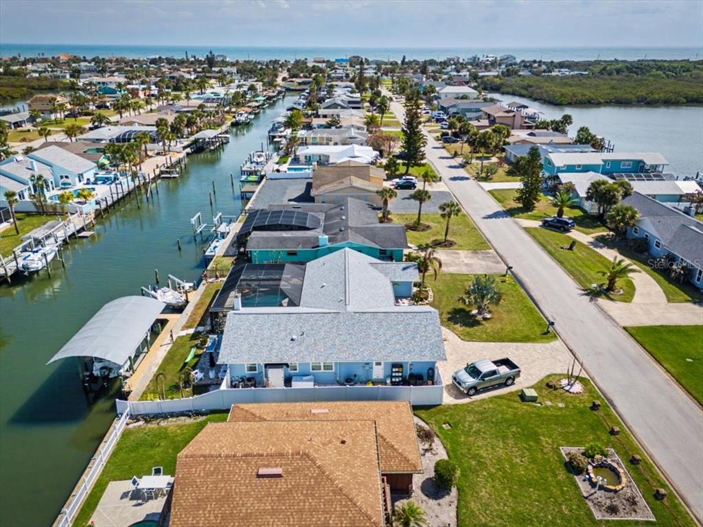 124 Anchor Drive Ponce Inlet, FL 32127 - Photo 56 of 77 an aerial view of a house with a lake view