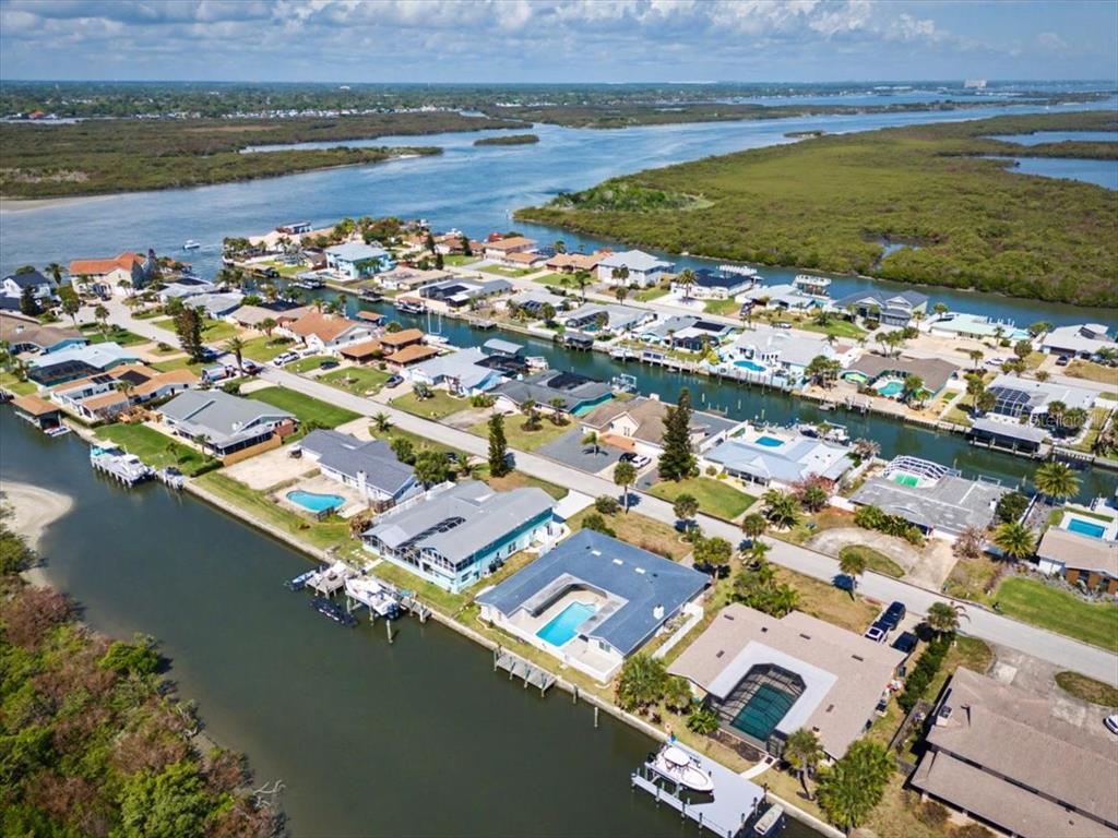 124 Anchor Drive Ponce Inlet, FL 32127 - Photo 62 of 77 a view of a city with an ocean