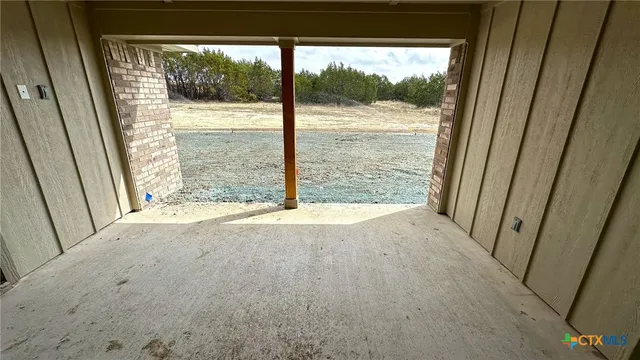 a view of a room with a window