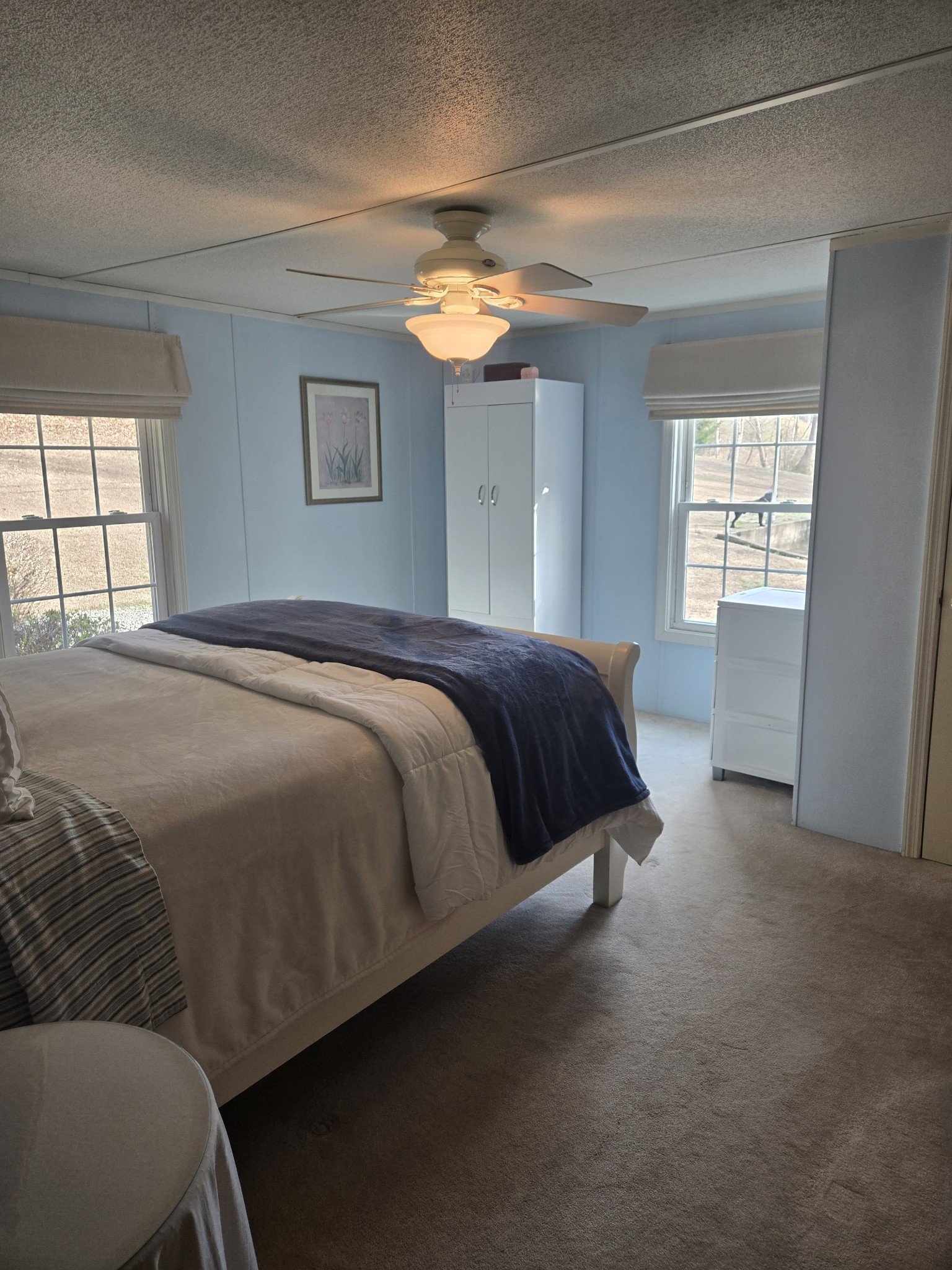 2130 Irwin Branch Road Waynesboro, TN 38485 - Photo 15 of 33 a spacious bedroom with a bed and a window