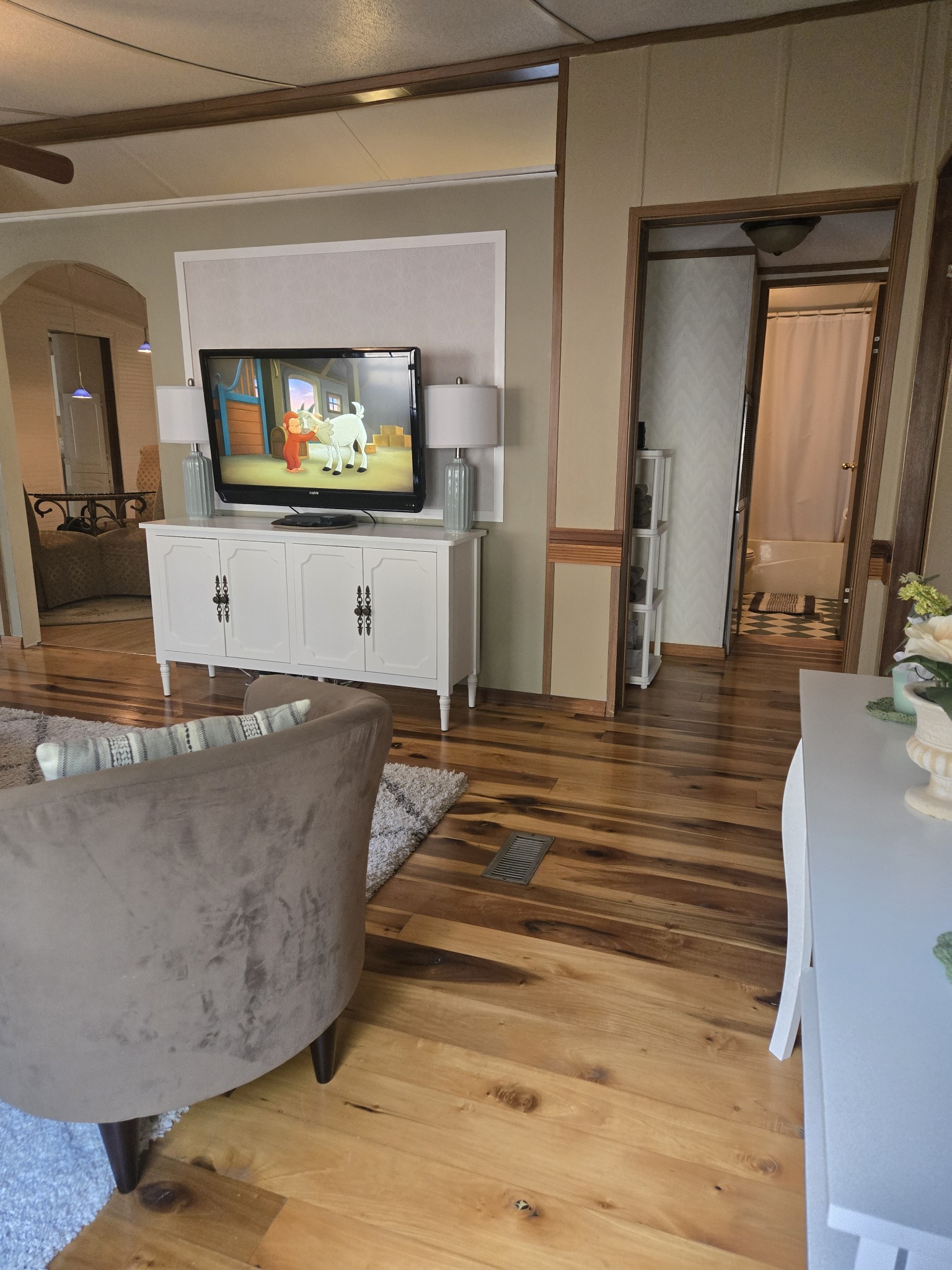 2130 Irwin Branch Road Waynesboro, TN 38485 - Photo 21 of 33 a living room with furniture and a flat screen tv