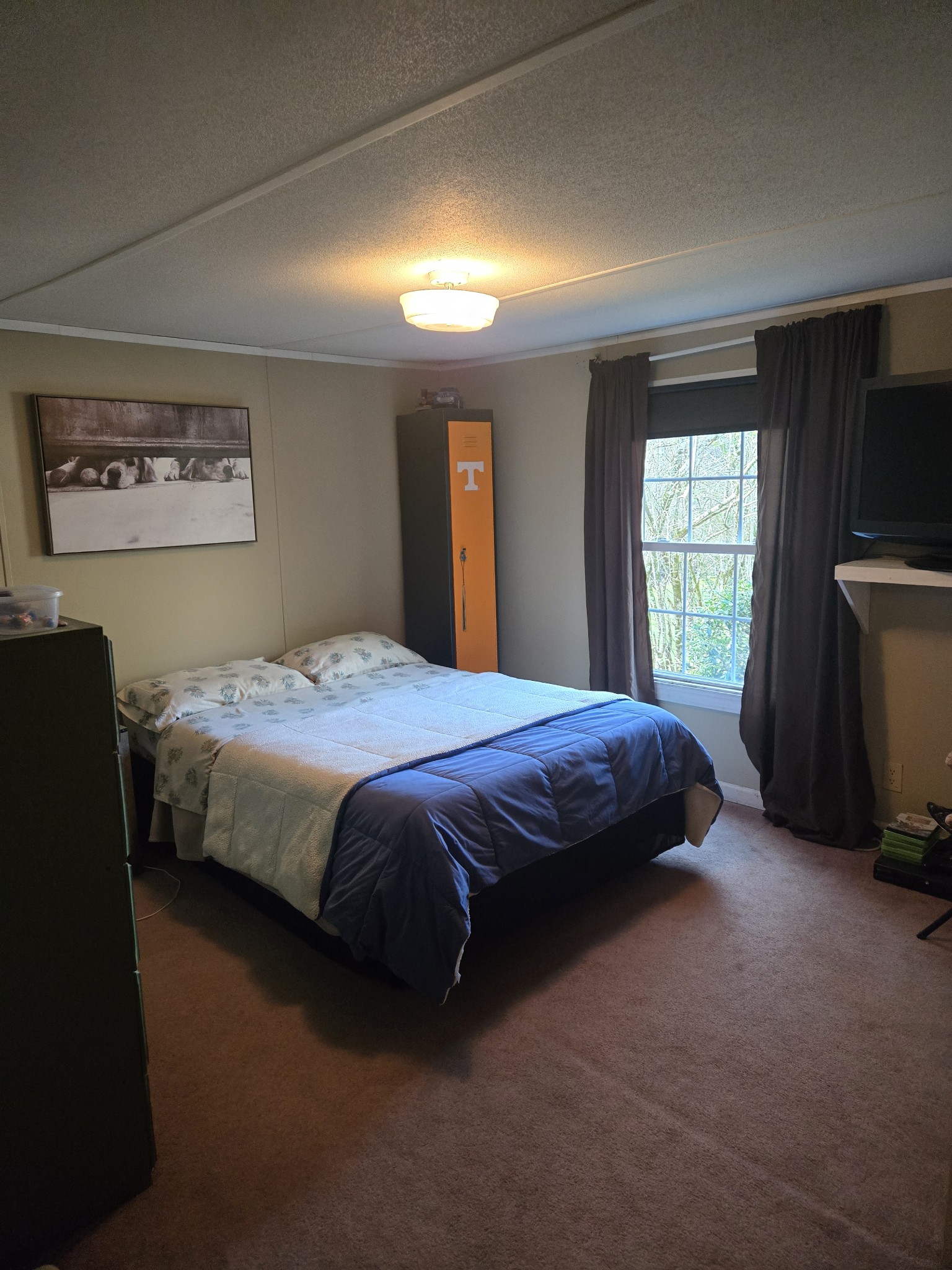 2130 Irwin Branch Road Waynesboro, TN 38485 - Photo 25 of 33 a spacious bedroom with a bed and a window