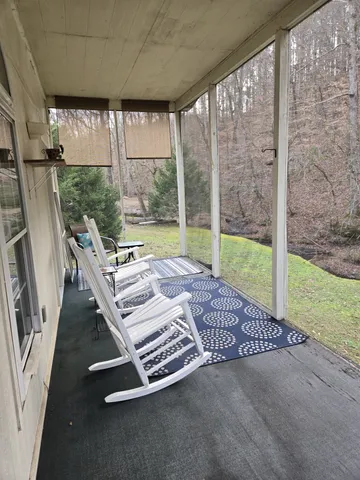 a view of a yard with a tree