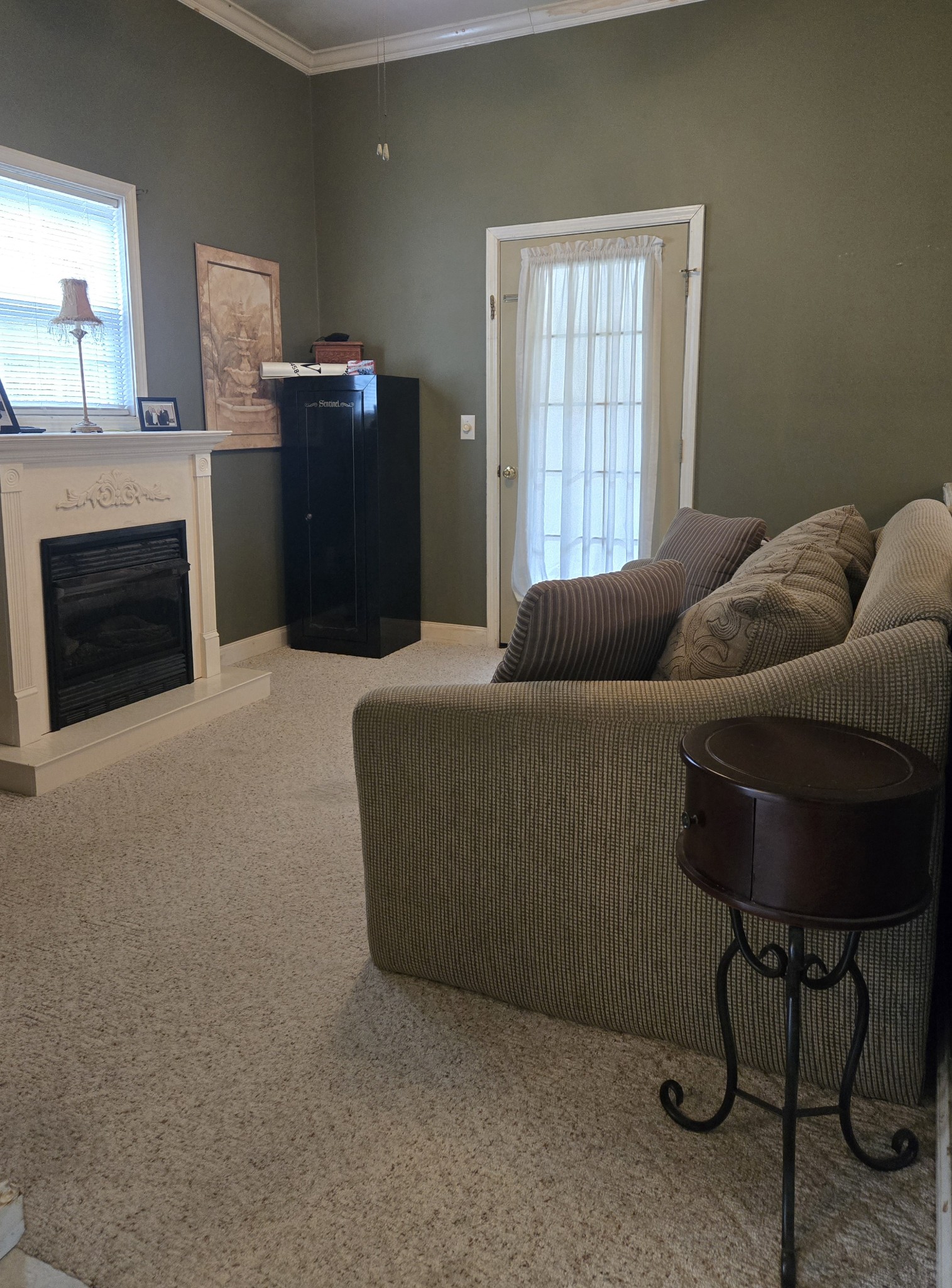 2130 Irwin Branch Road Waynesboro, TN 38485 - Photo 5 of 33 a living room with furniture and a fireplace