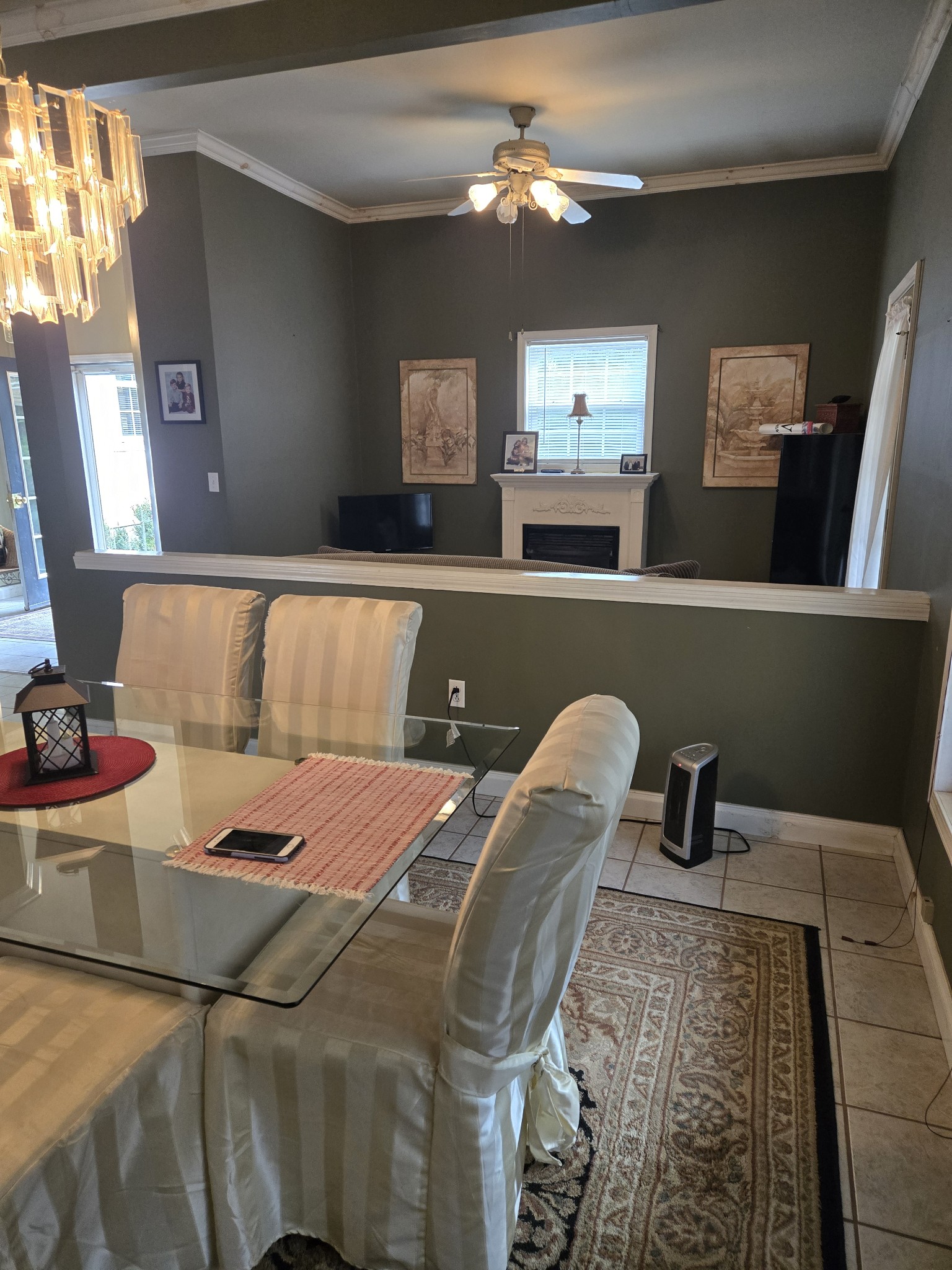 2130 Irwin Branch Road Waynesboro, TN 38485 - Photo 7 of 33 a bedroom with a bed and a chandelier