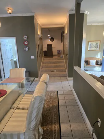 a kitchen with a sink and a stove top oven