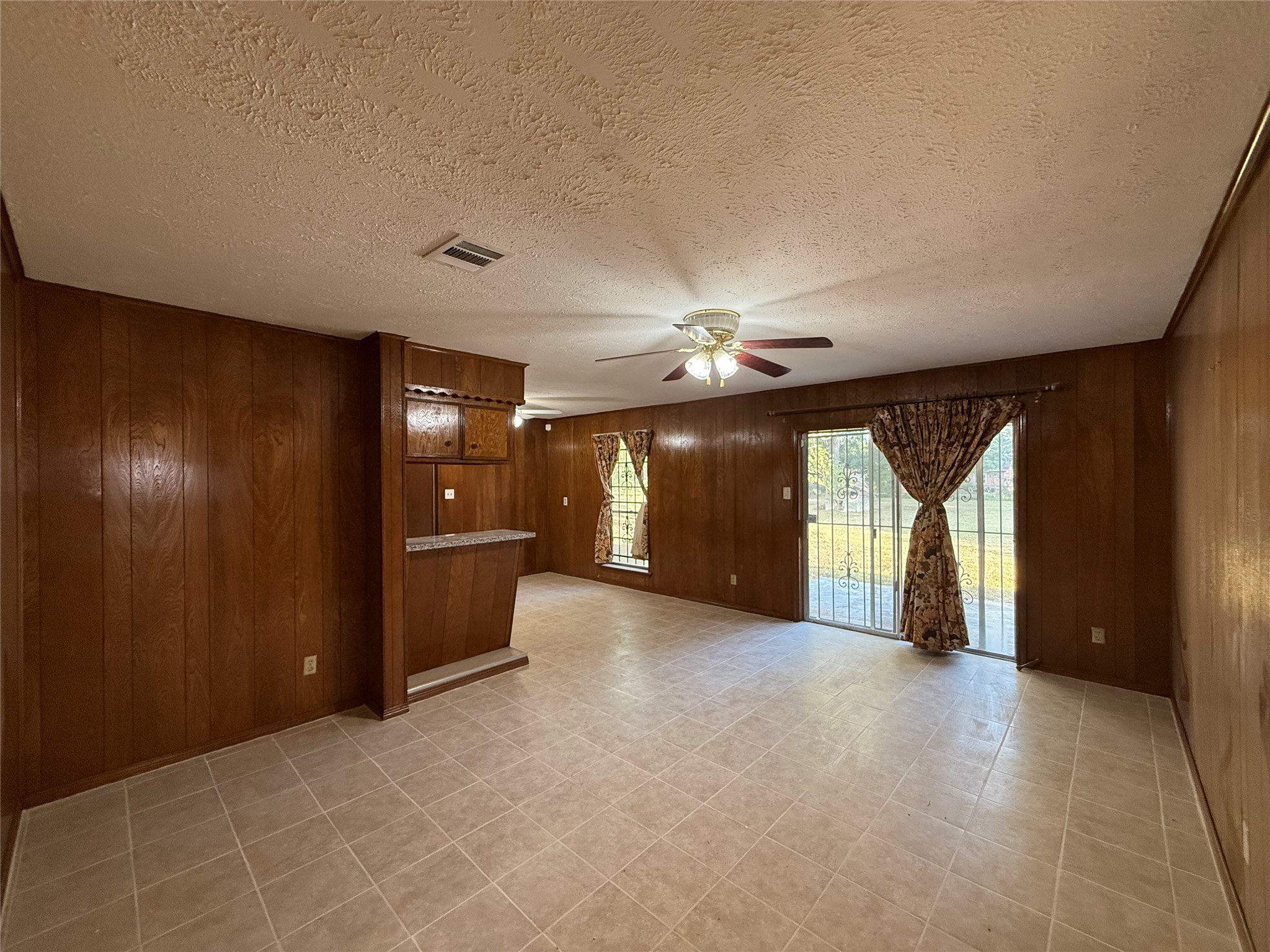 7325 Ley Road Houston, TX 77028 - Photo 20 of 50 wooden floor in an empty room with a window