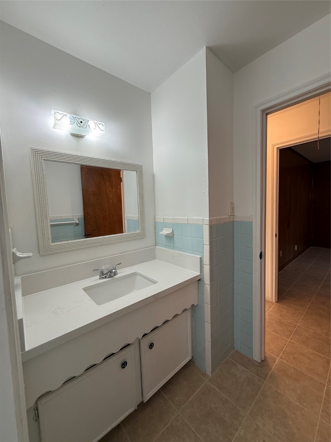 7325 Ley Road Houston, TX 77028 - Photo 25 of 50 a bathroom with a double vanity sink and mirror