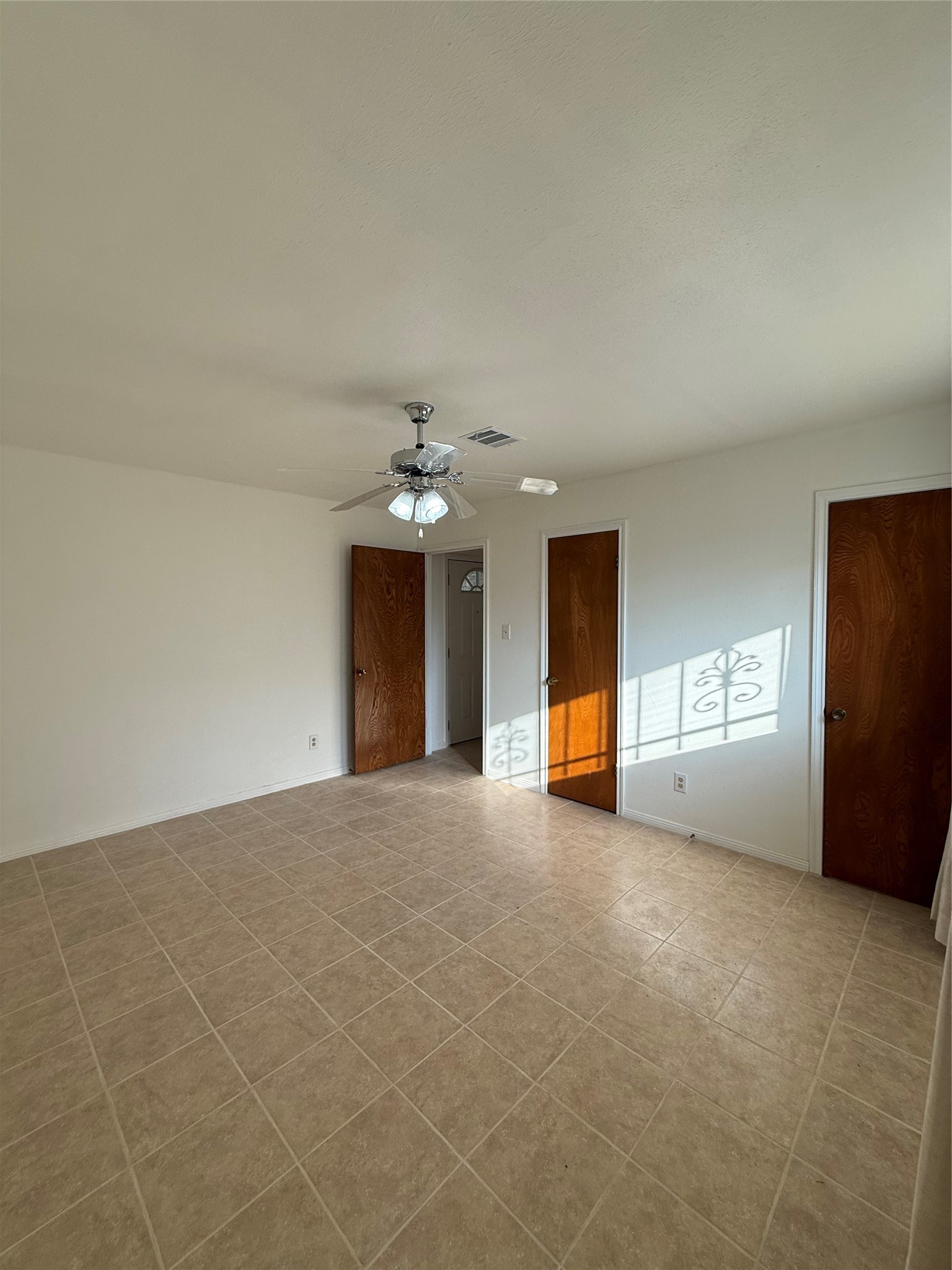 7325 Ley Road Houston, TX 77028 - Photo 34 of 50 a view of a big room with windows and fireplace