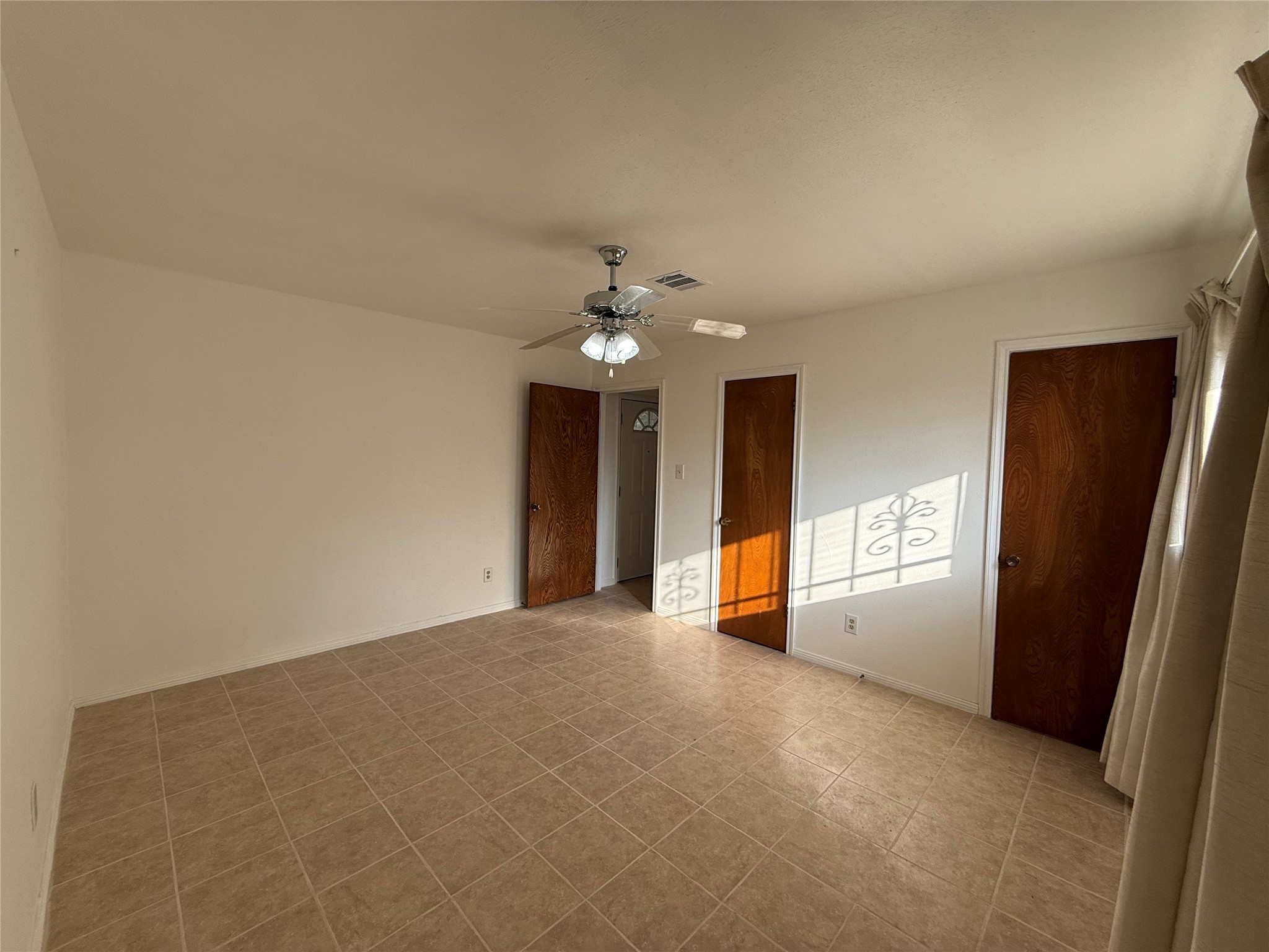 7325 Ley Road Houston, TX 77028 - Photo 35 of 50 a view of an empty room with a window