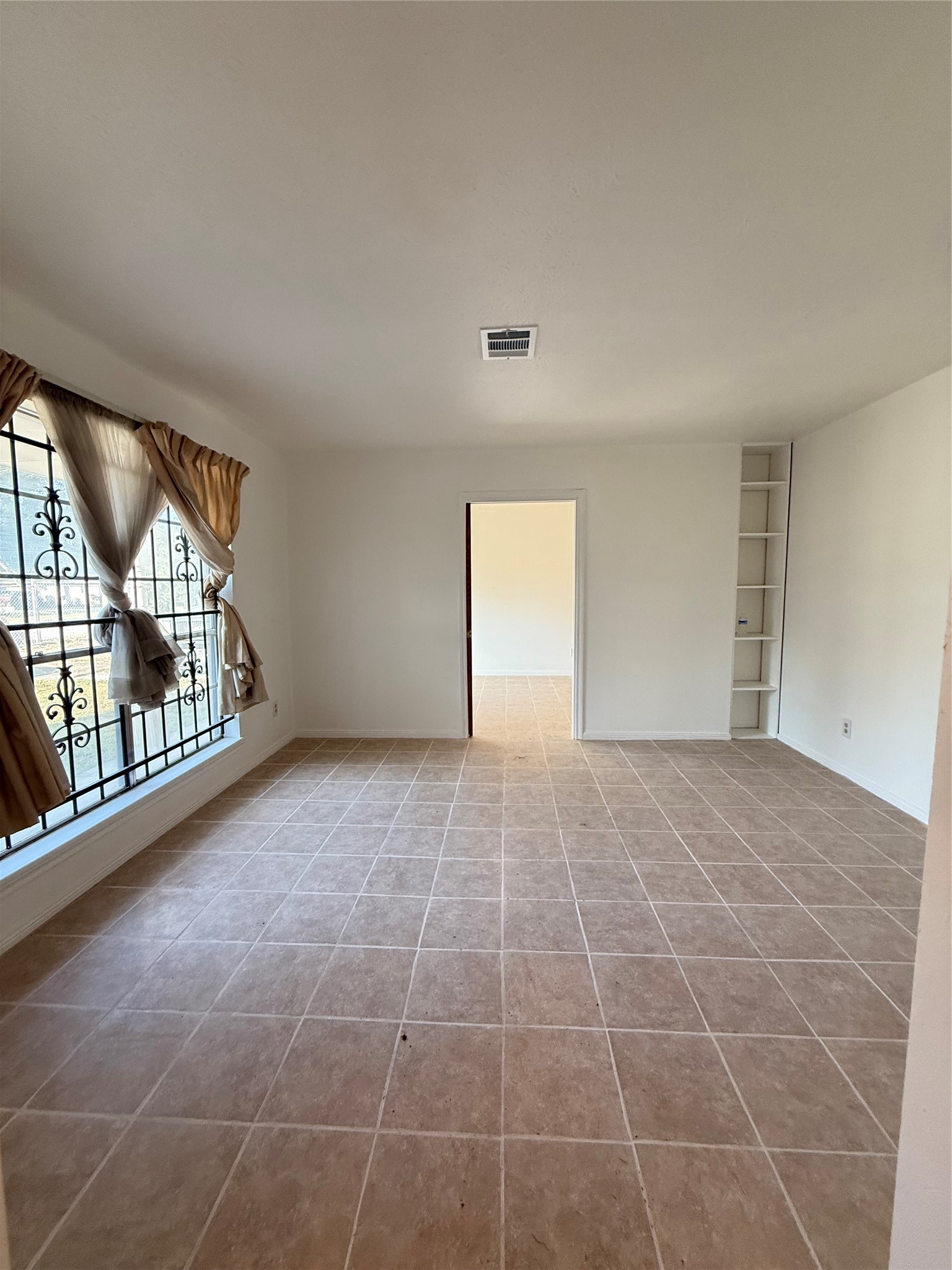 7325 Ley Road Houston, TX 77028 - Photo 36 of 50 a view of an empty room and window