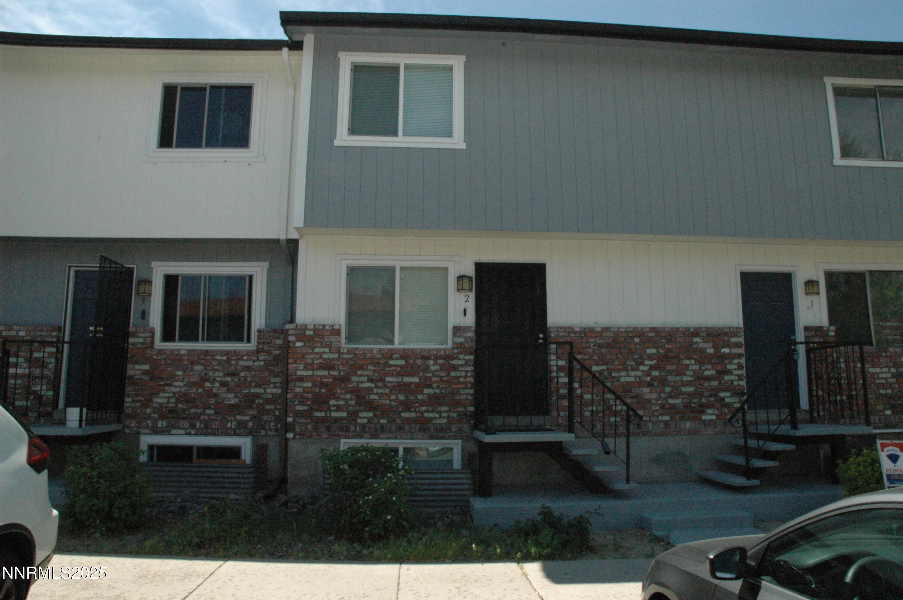 1424 East 9th Street, Unit 2 Reno, NV 89512 - Photo 1 of 20 a view of house with yard