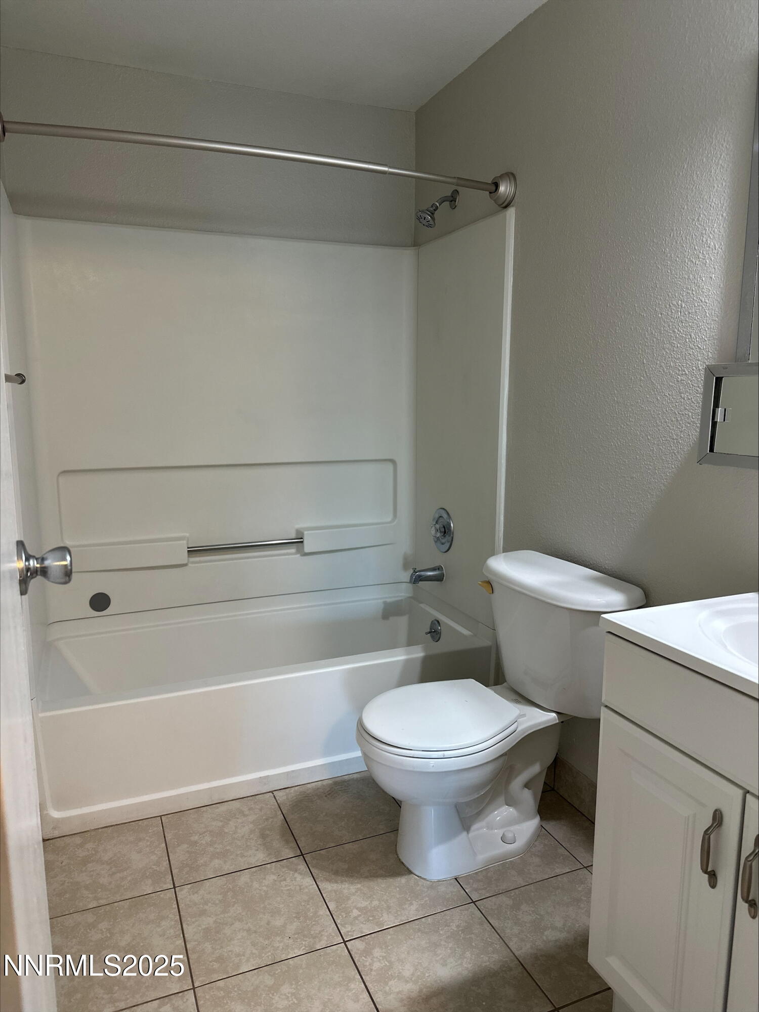 1424 East 9th Street, Unit 2 Reno, NV 89512 - Photo 11 of 20 a bathroom with a toilet and a shower