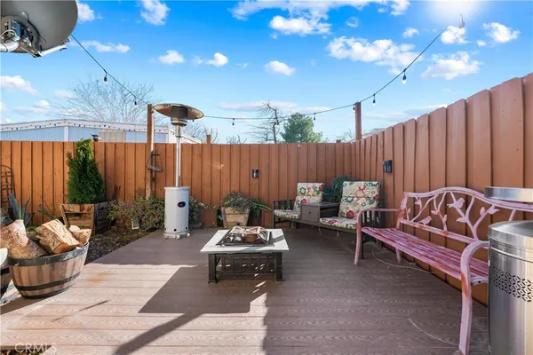 a outdoor space with patio couch and a potted plant