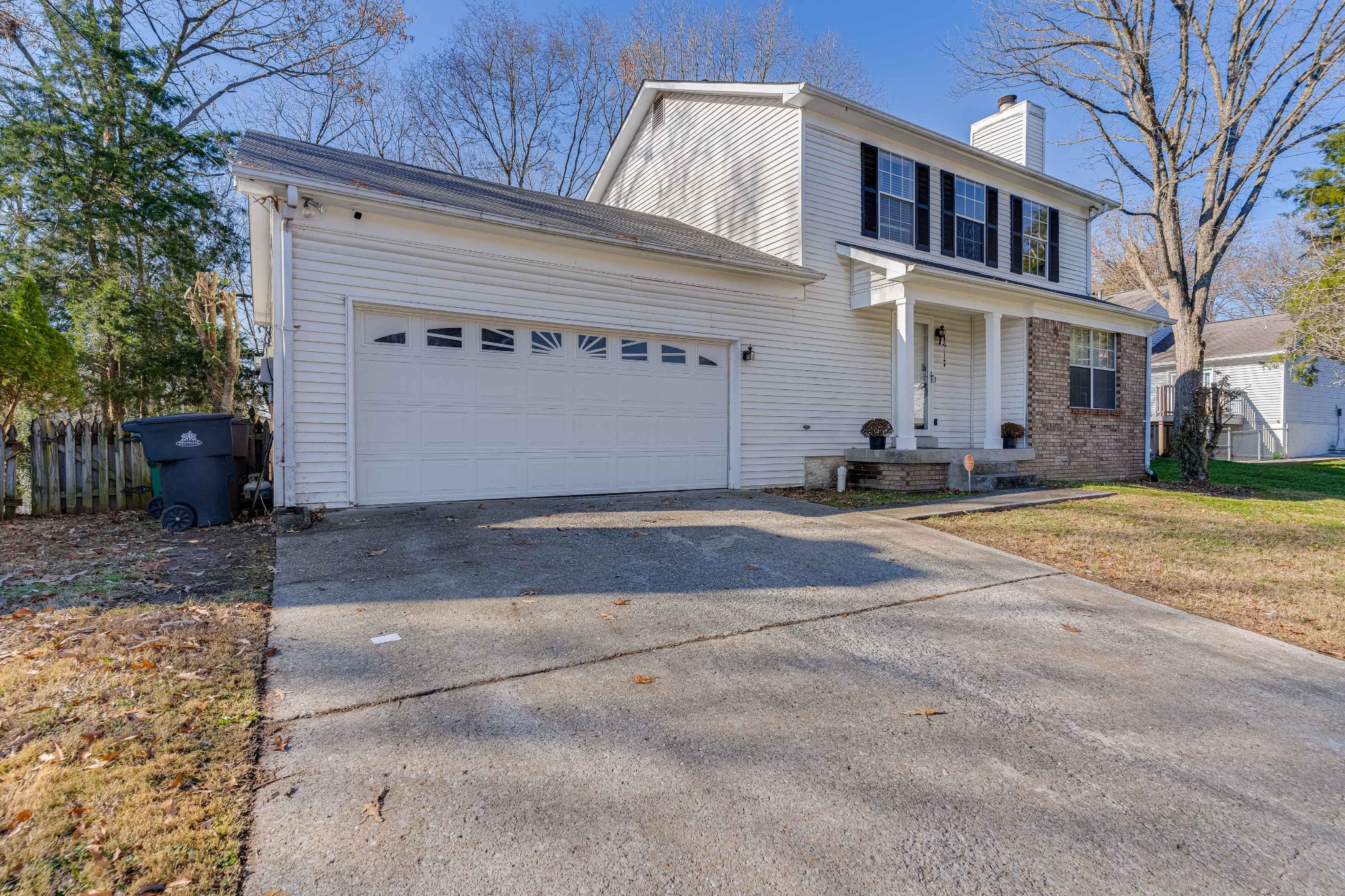 1016 Aldersgate Road Antioch, TN 37013 - Photo 2 of 31 a view of a white house with a large tree