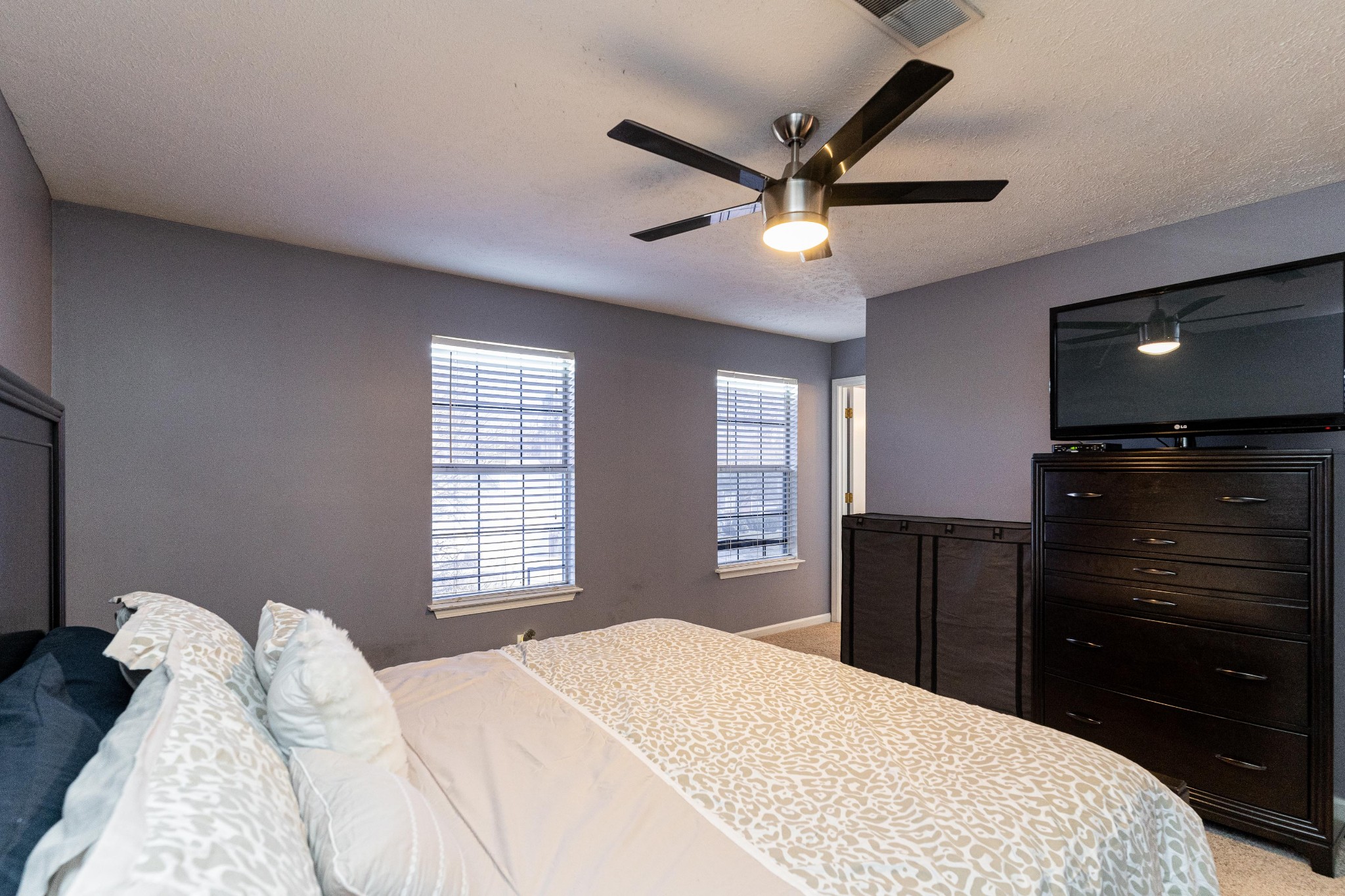 1016 Aldersgate Road Antioch, TN 37013 - Photo 18 of 31 a bedroom with a bed and a dresser