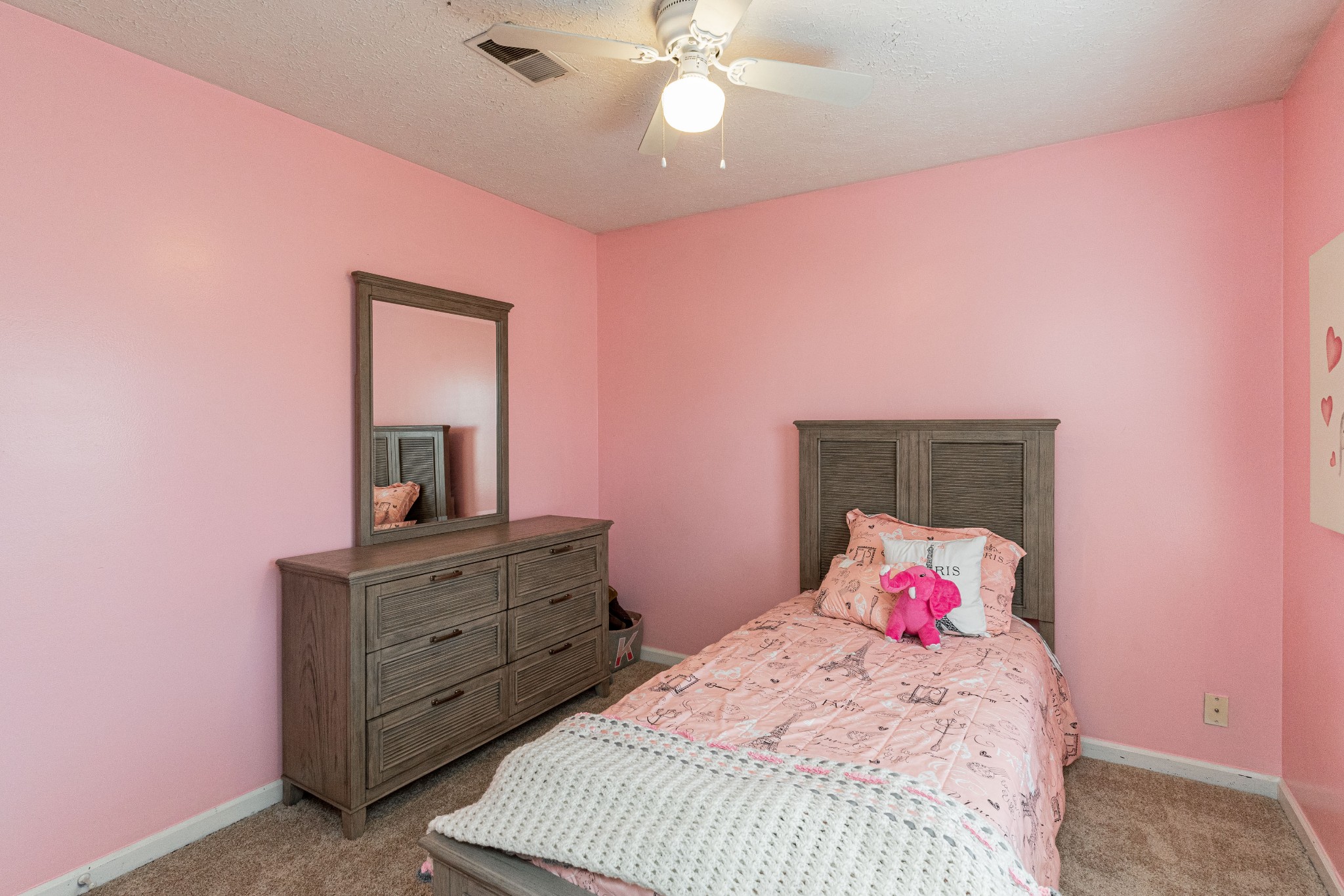 1016 Aldersgate Road Antioch, TN 37013 - Photo 22 of 31 a bedroom with a bed and a dresser