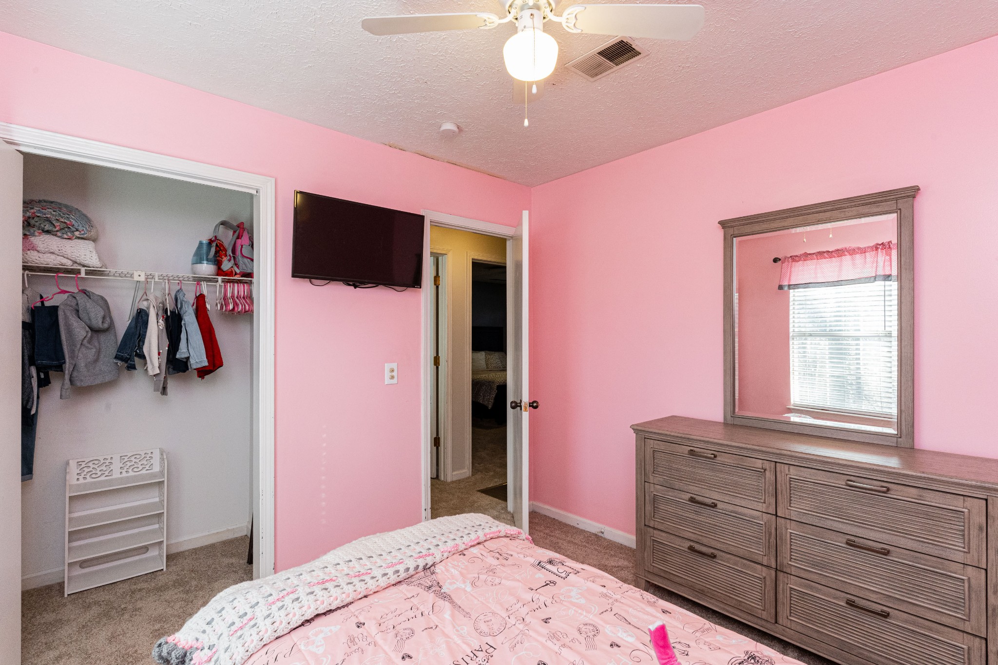 1016 Aldersgate Road Antioch, TN 37013 - Photo 23 of 31 a bedroom with a bed and a dresser