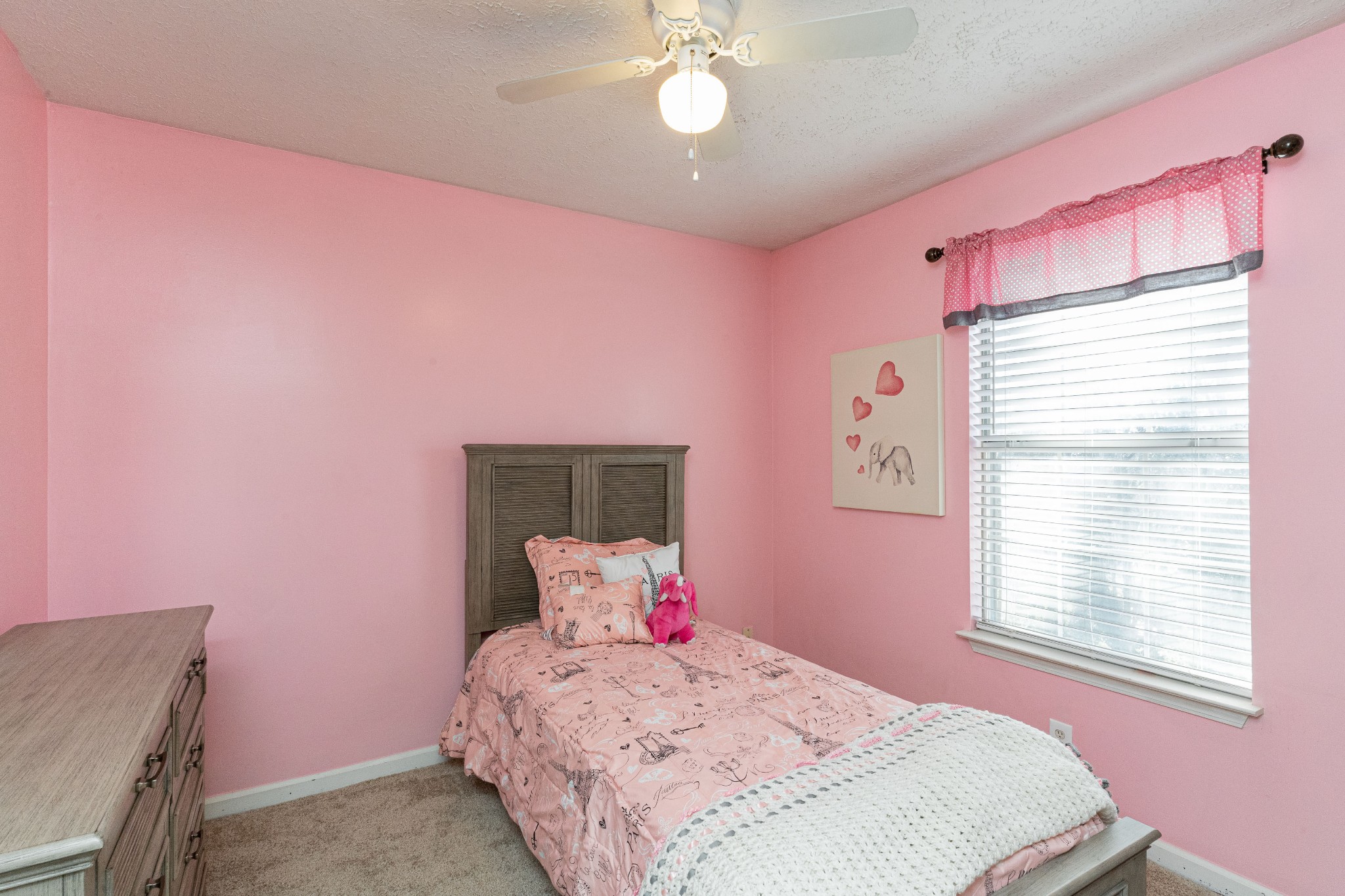 1016 Aldersgate Road Antioch, TN 37013 - Photo 24 of 31 a bedroom with a bed and a chandelier