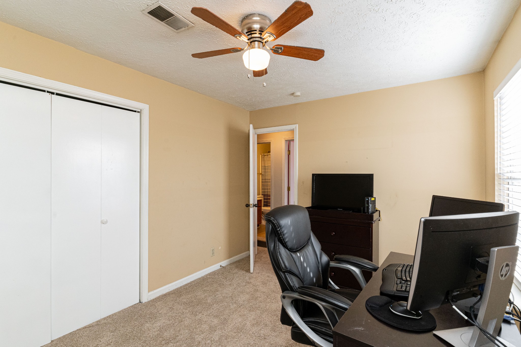 1016 Aldersgate Road Antioch, TN 37013 - Photo 26 of 31 a view of a workspace with furniture and a window