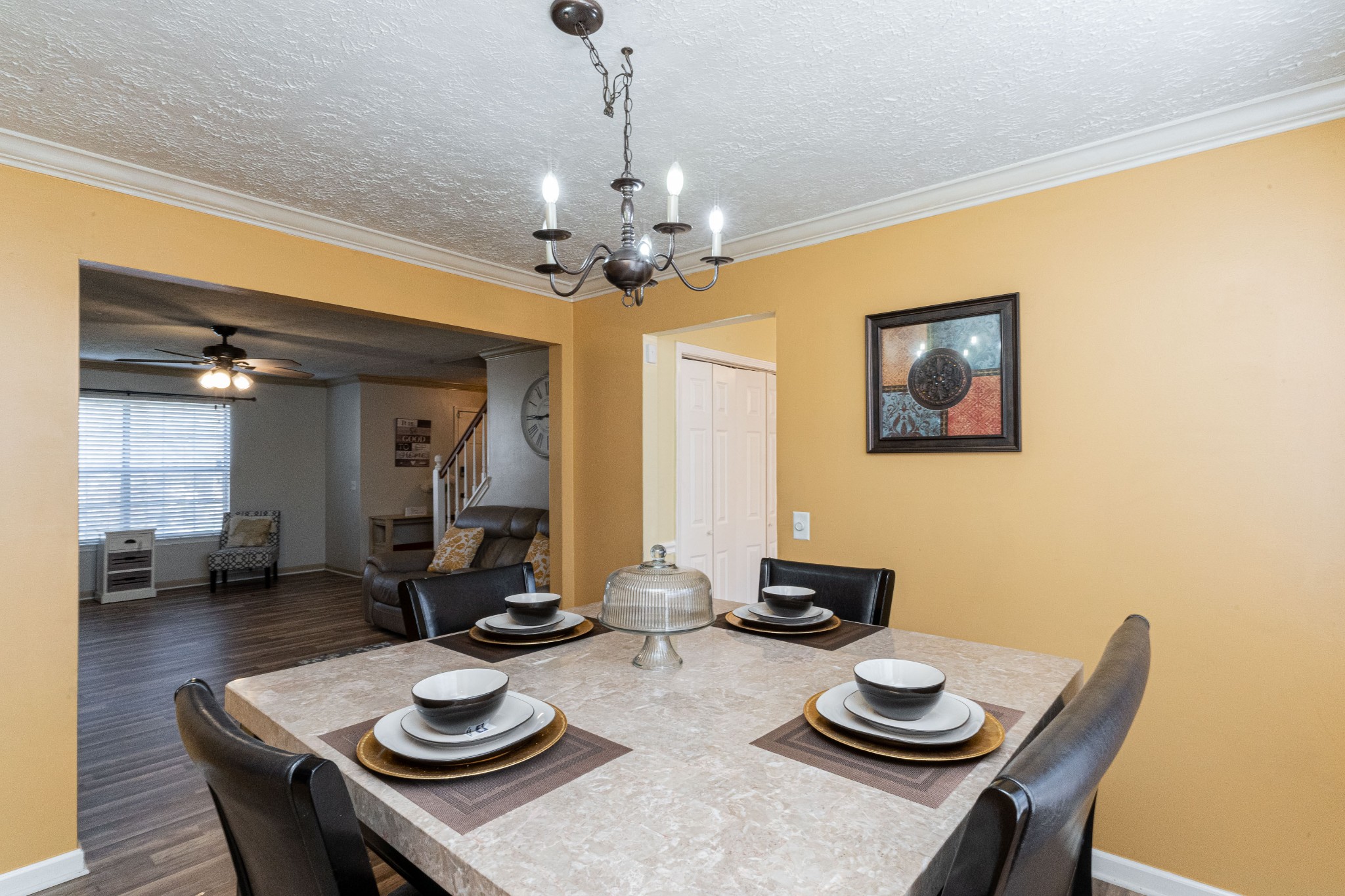 1016 Aldersgate Road Antioch, TN 37013 - Photo 10 of 31 a view of a dining room with furniture a chandelier and wooden floor