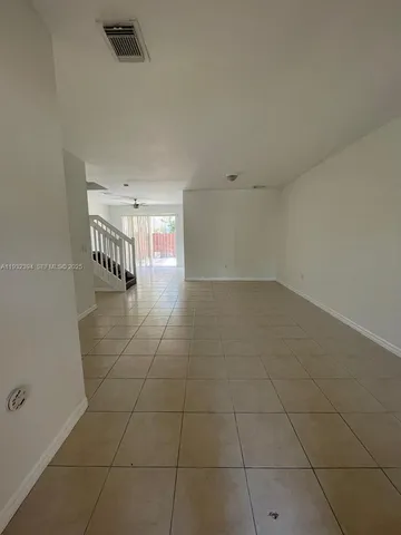 a view of hallway with a window