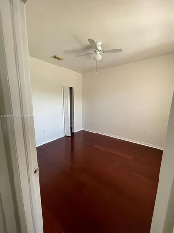 an empty room with a bathroom