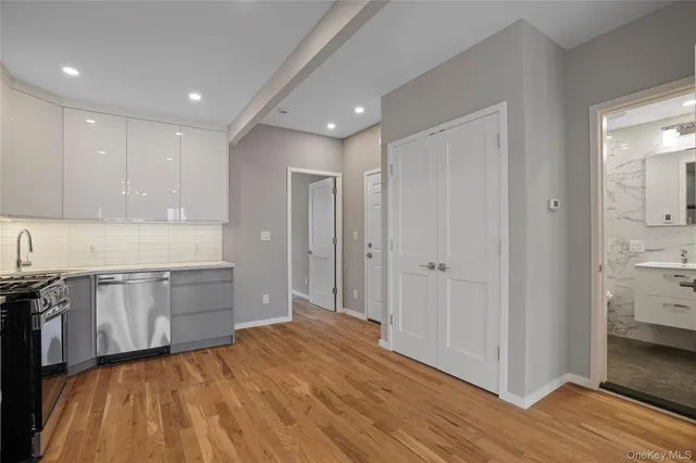 a view of entryway with wooden floor