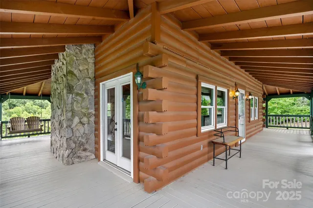 a view of a patio with wooden floor