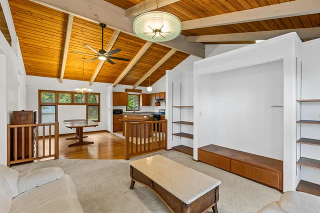 a gym room with wooden furniture and a window