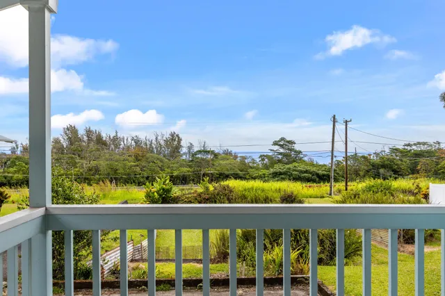 a view of a city skyline from a balcony