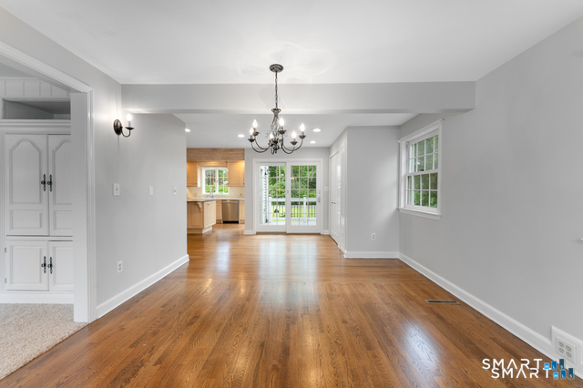 62 Chatham Road Berlin, CT 06037 - Photo 11 of 38 a view of an empty room with wooden floor and a window