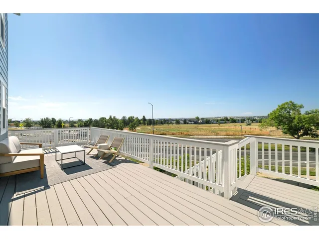 a view of roof deck with patio