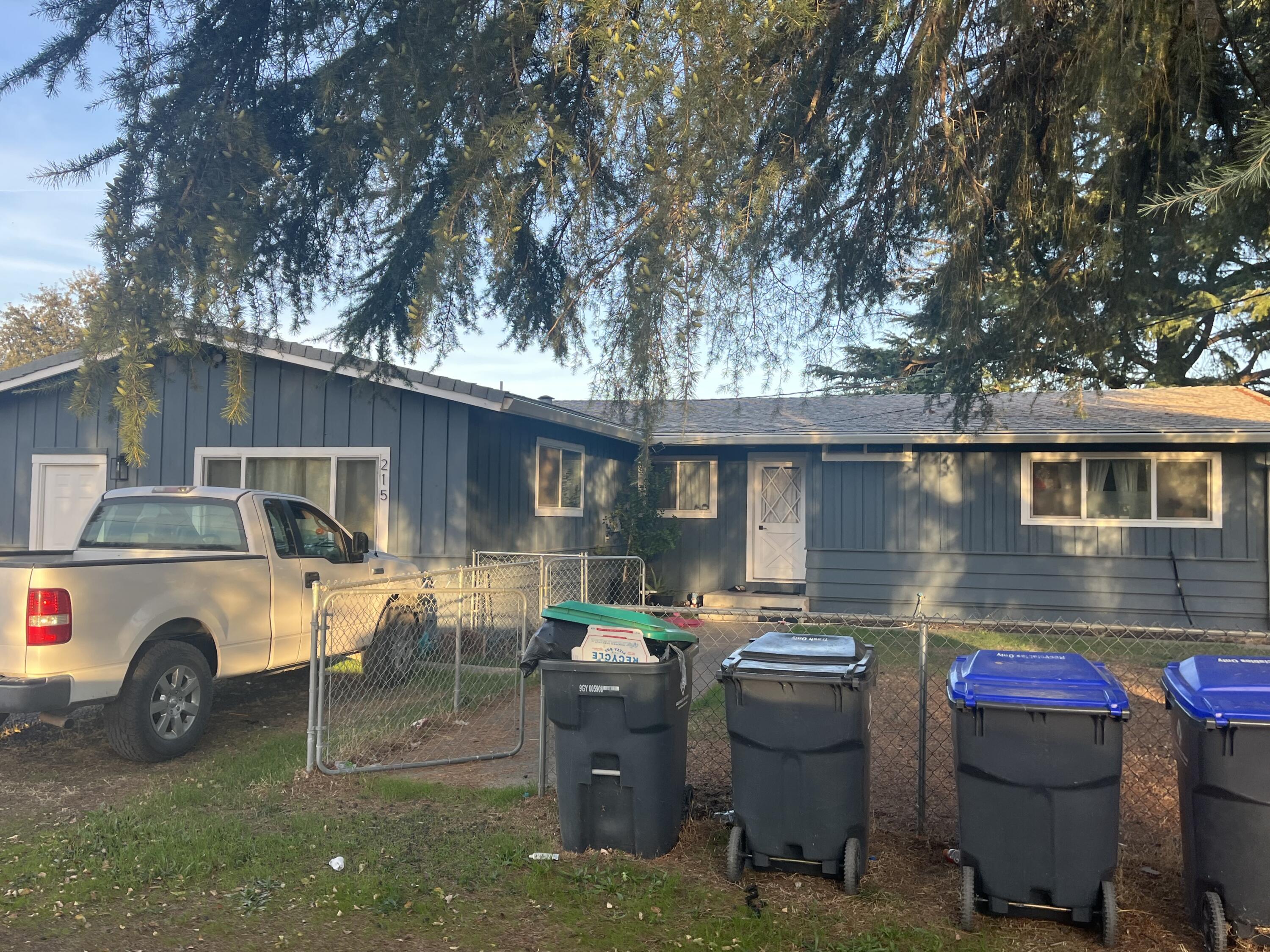 566 Roundup Avenue Red Bluff, CA 96080 - Photo 8 of 16 a view of a car park in front of house