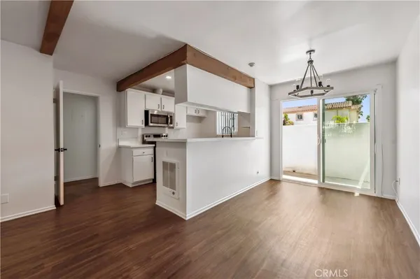 a kitchen with stainless steel appliances granite countertop lots of counter space sink and stove