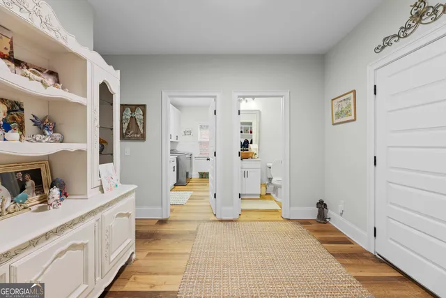 a bathroom with a sink a mirror and shower