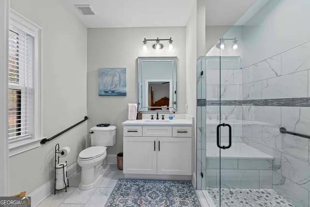 a room with gym equipment and a large window