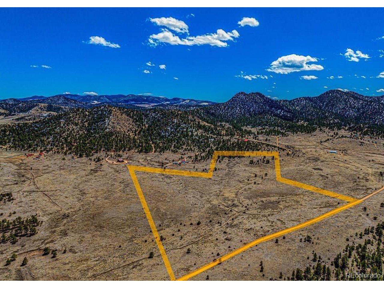 36 Marcey Road Westcliffe, CO 81252 - Photo 22 of 25 a view of a swimming pool with a lake view