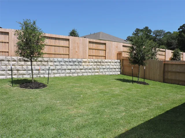 a view of a backyard with a garden