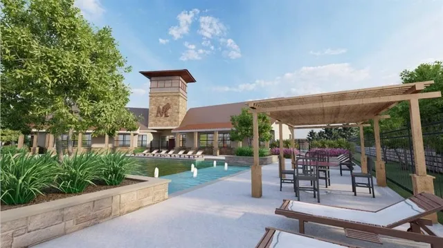 a patio with a yard table and chairs