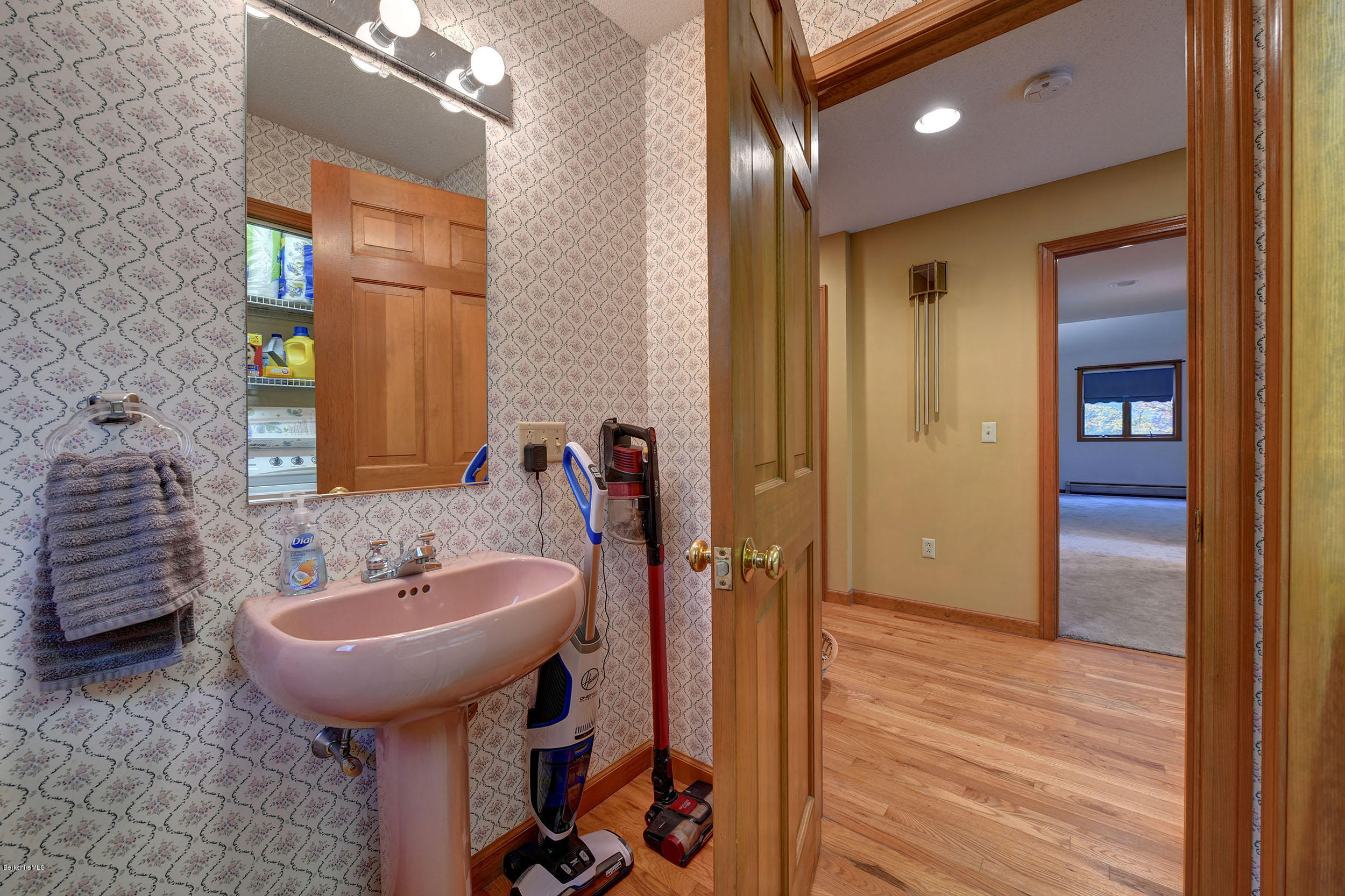 99 Jacobs Hollow Road Becket, MA 01223 - Photo 13 of 39 a bathroom with a sink and a mirror