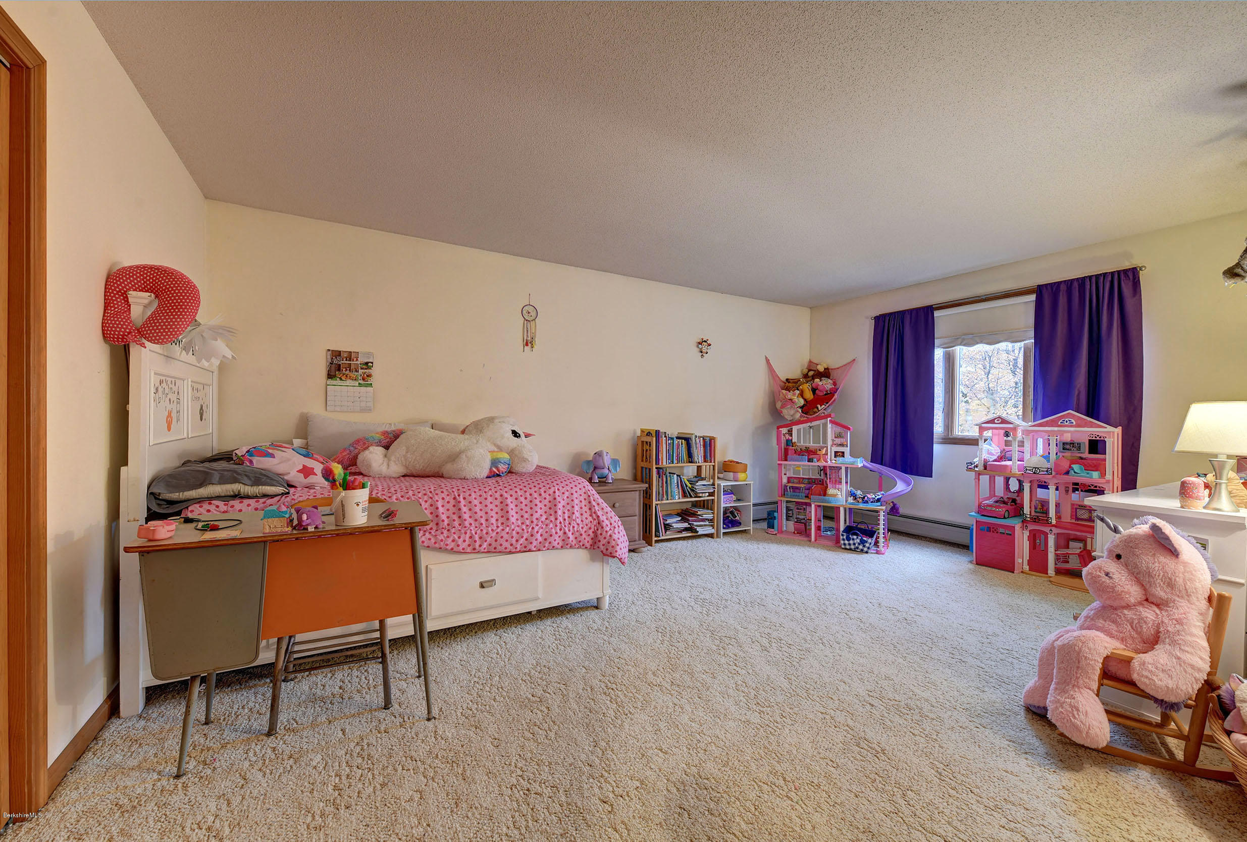 99 Jacobs Hollow Road Becket, MA 01223 - Photo 35 of 39 a bedroom with furniture and a couch