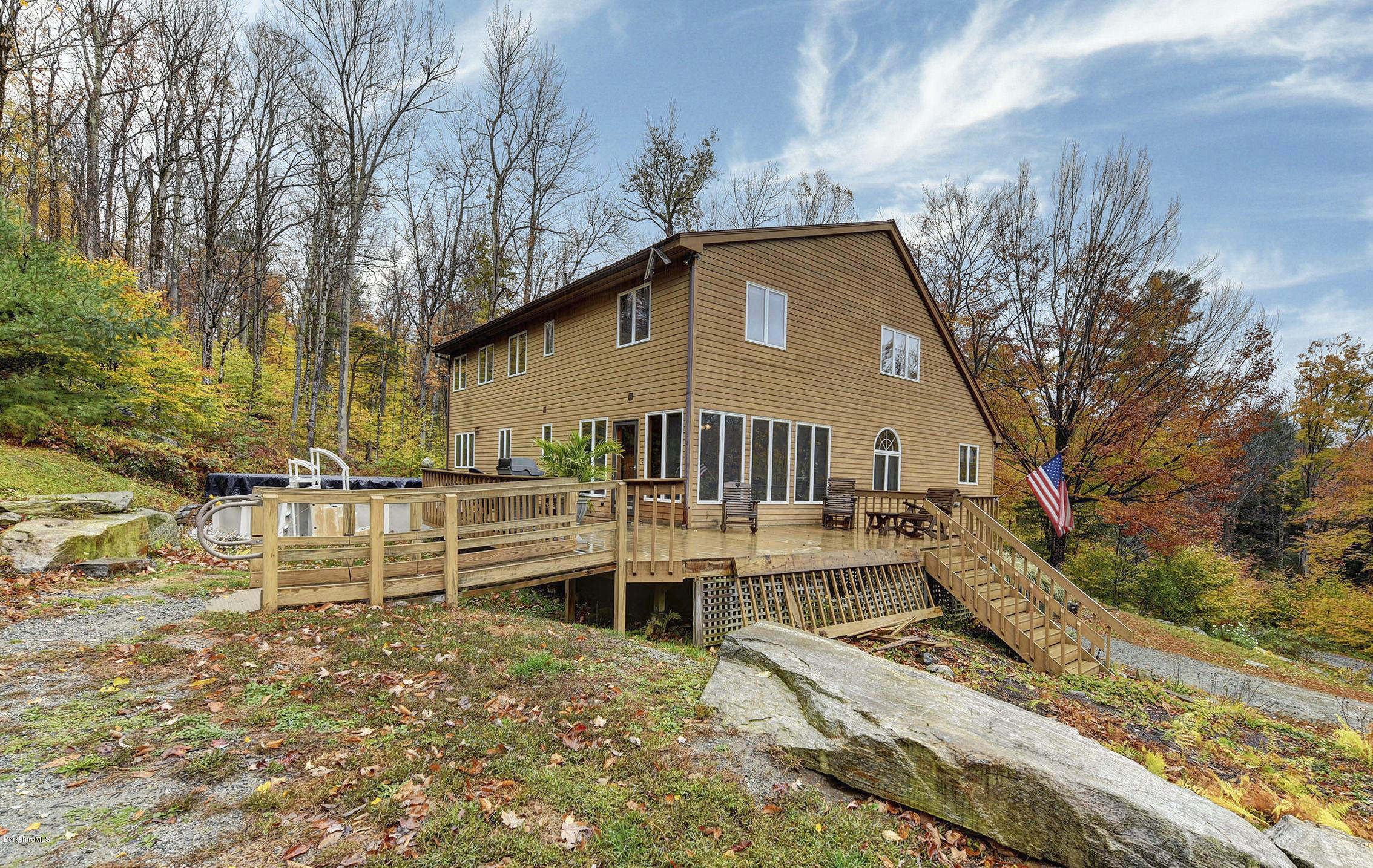 99 Jacobs Hollow Road Becket, MA 01223 - Photo 5 of 39 a view of a house with a yard