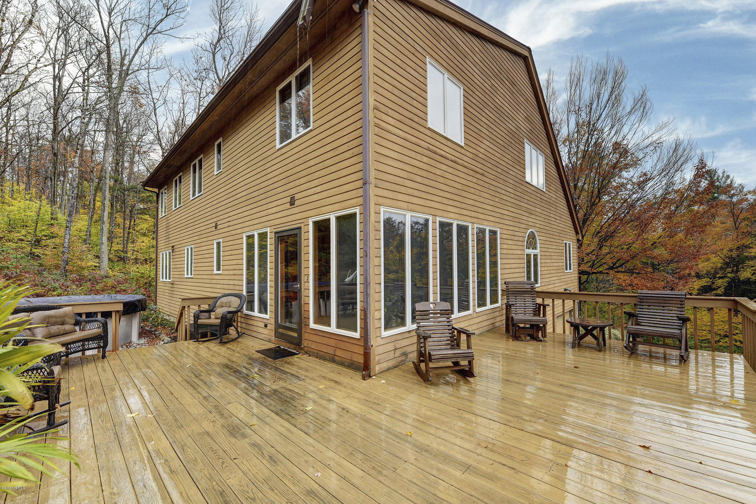 99 Jacobs Hollow Road Becket, MA 01223 - Photo 8 of 39 a view of a house with sitting area