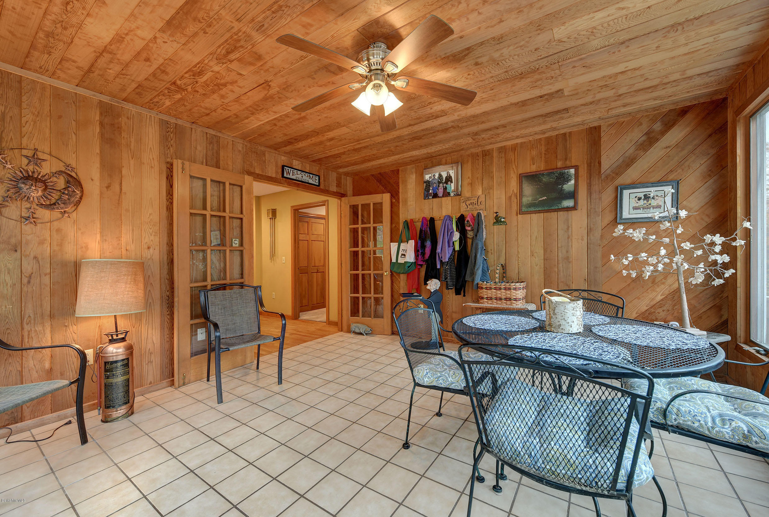 99 Jacobs Hollow Road Becket, MA 01223 - Photo 10 of 39 a view of a livingroom with furniture and a dining table
