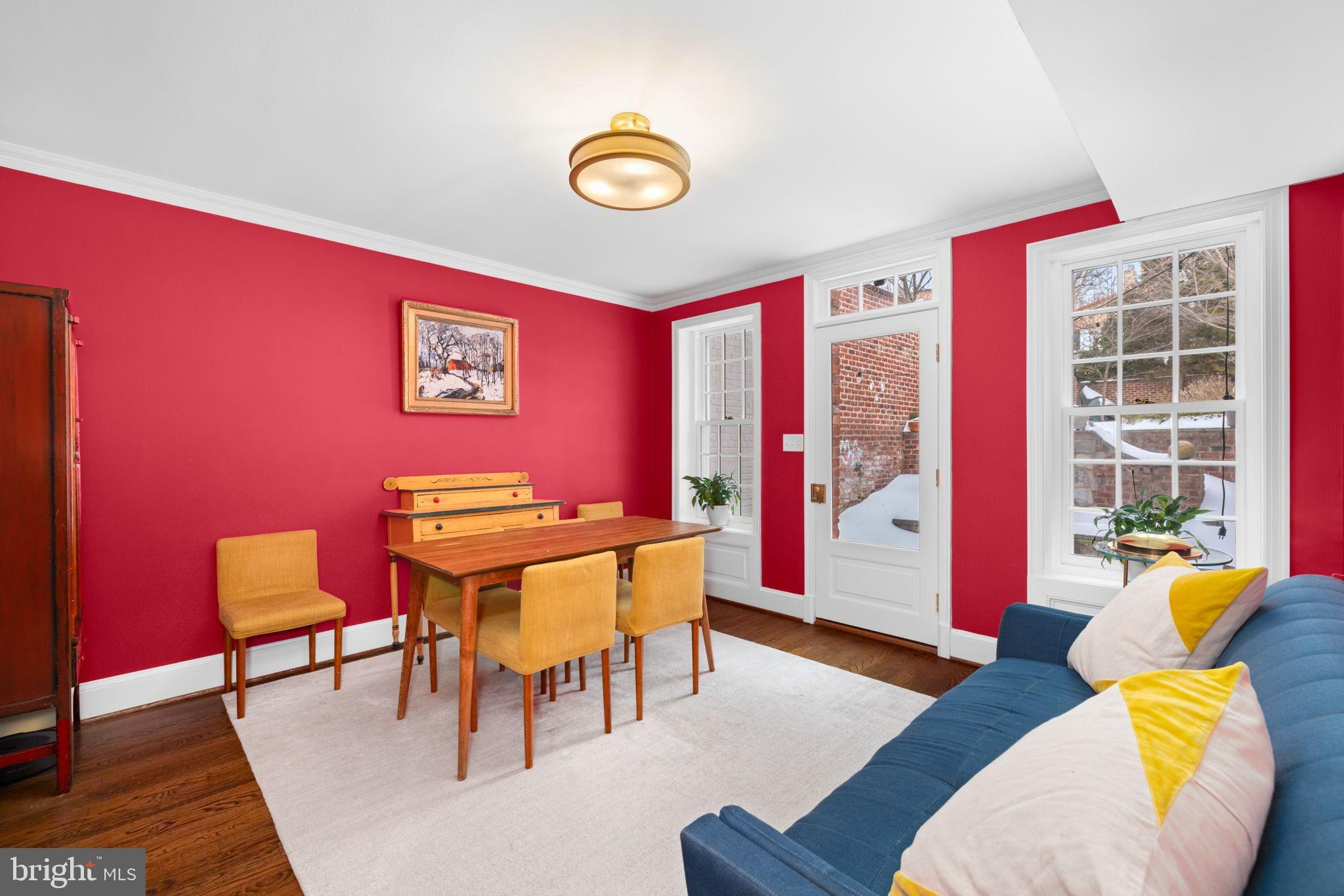 3127 O Street Northwest Washington, DC 20007 - Photo 3 of 11 a living room with furniture and a wooden floor