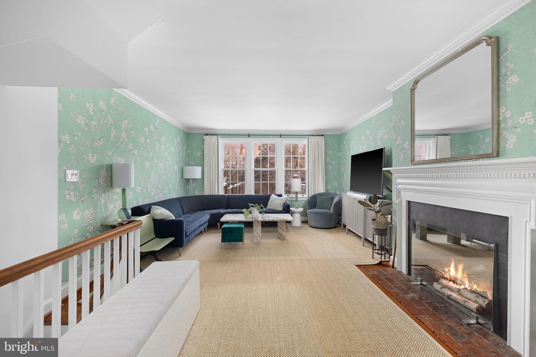 3127 O Street Northwest Washington, DC 20007 - Photo 5 of 13 a living room with furniture and a fireplace