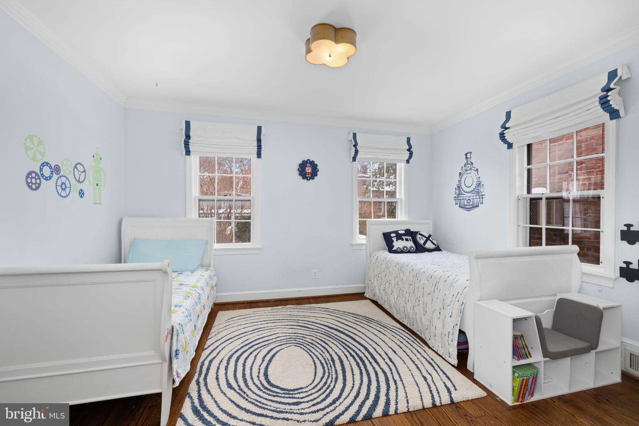 3127 O Street Northwest Washington, DC 20007 - Photo 6 of 13 a bedroom with a bed and a window